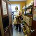Perihen Raouf, 62, of Ann Arbor, looks over a bag of fruit in the food pantry at Bryant Community Center on Wednesday, April 24, 2013. Only one client is allowed to shop in the pantry at a time because the pantry is so small. Melanie Maxwell I AnnArbor.com